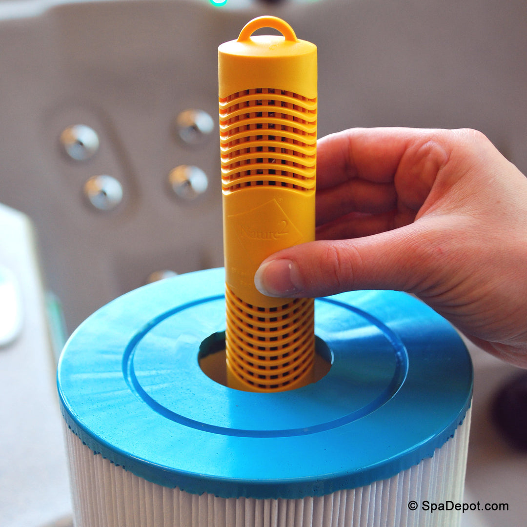 Placing Nature2 cartridge in filter.